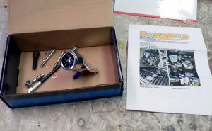 BP Oil Gauge Kit parts unwrapped, and installation instructions.
