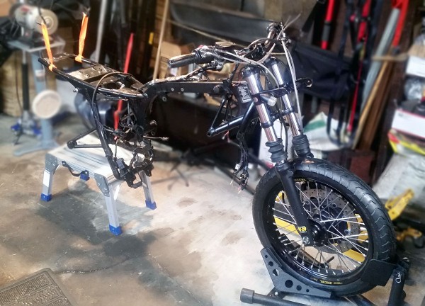 Front Forks, Bars and Wheel Assembly Installed Front Forks, Bars and Wheel Assembly Installed