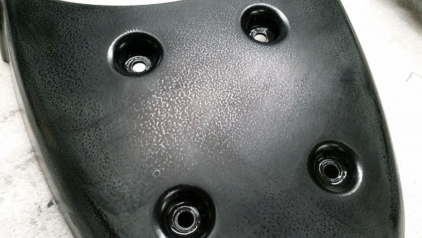 Close up of rear seat panel after one round of 800 grit wet sanding.