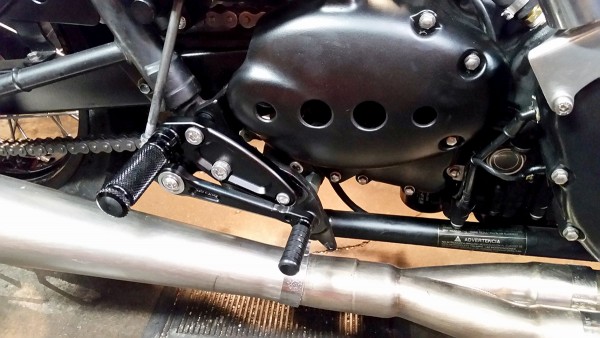 Fully installed Sato Racing Rearset (black) - right side footpeg and rear brake lever setup.